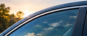 Side window of a car in evening light